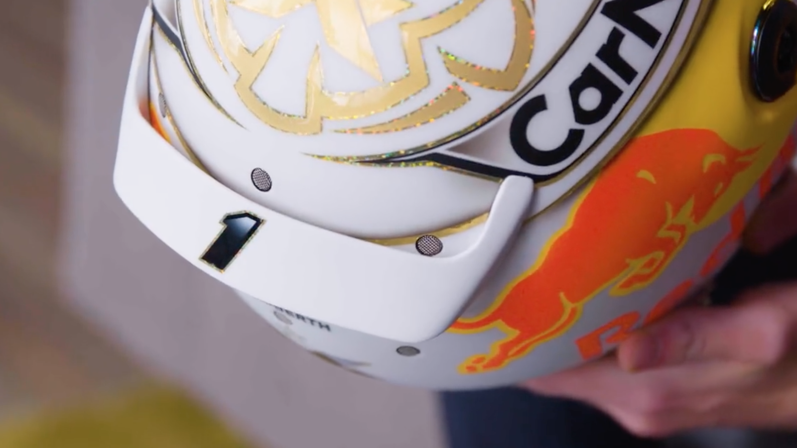 Verstappen reveals new helmet design with No.1 for F1 title defence
